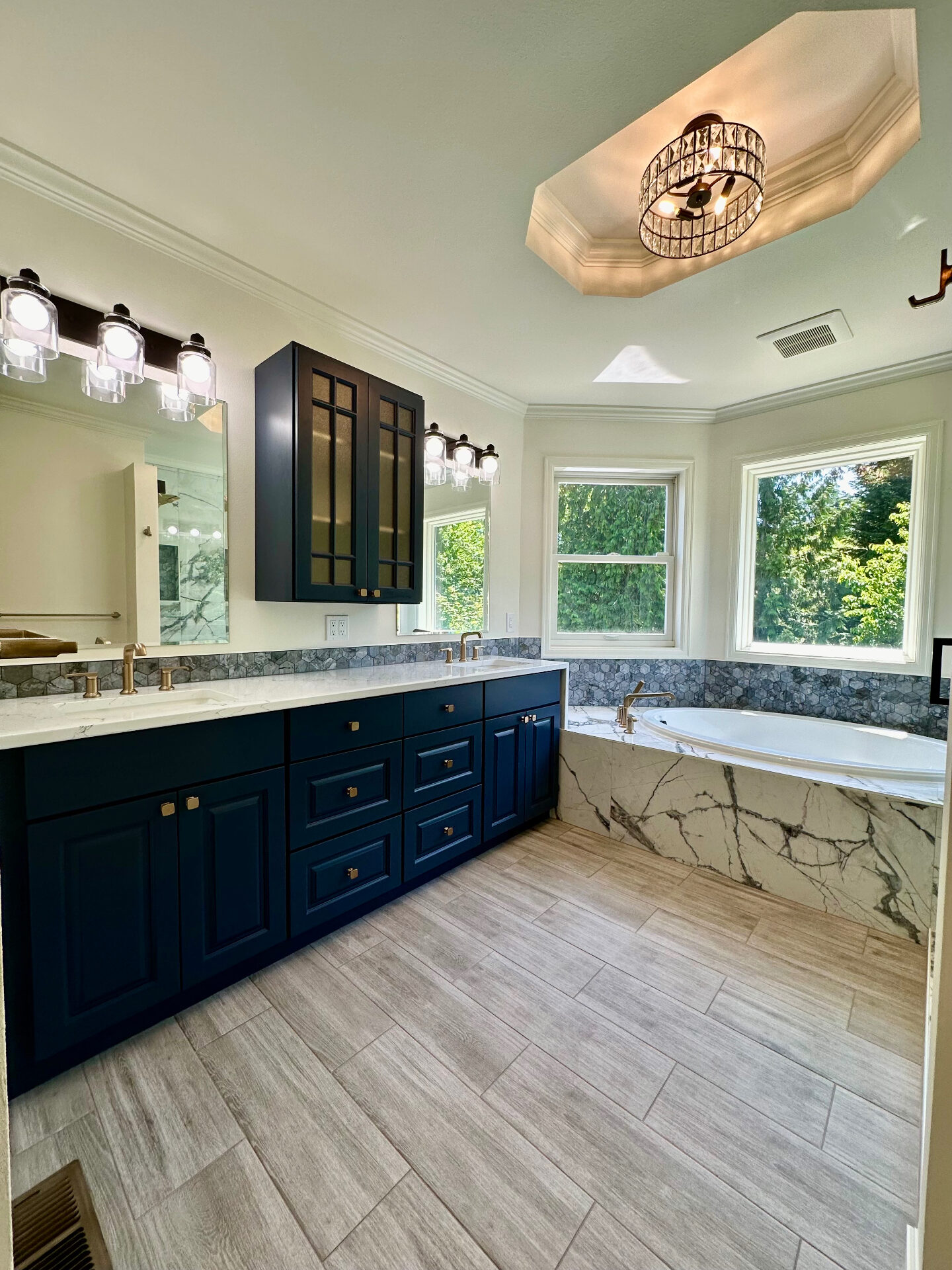 Navy Vanity Master Suite — Bathroom Remodeling project by JVB Contractors